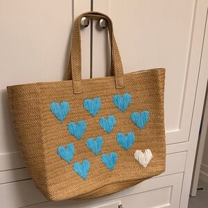 Stylish Tan Tote Bag with Blue and White Heart Accents